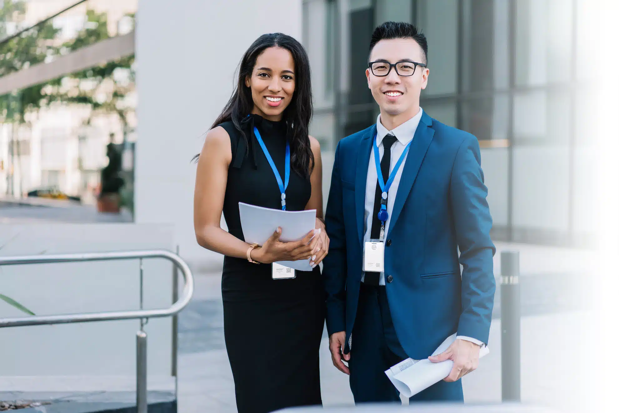 Woman and man standing outside government building